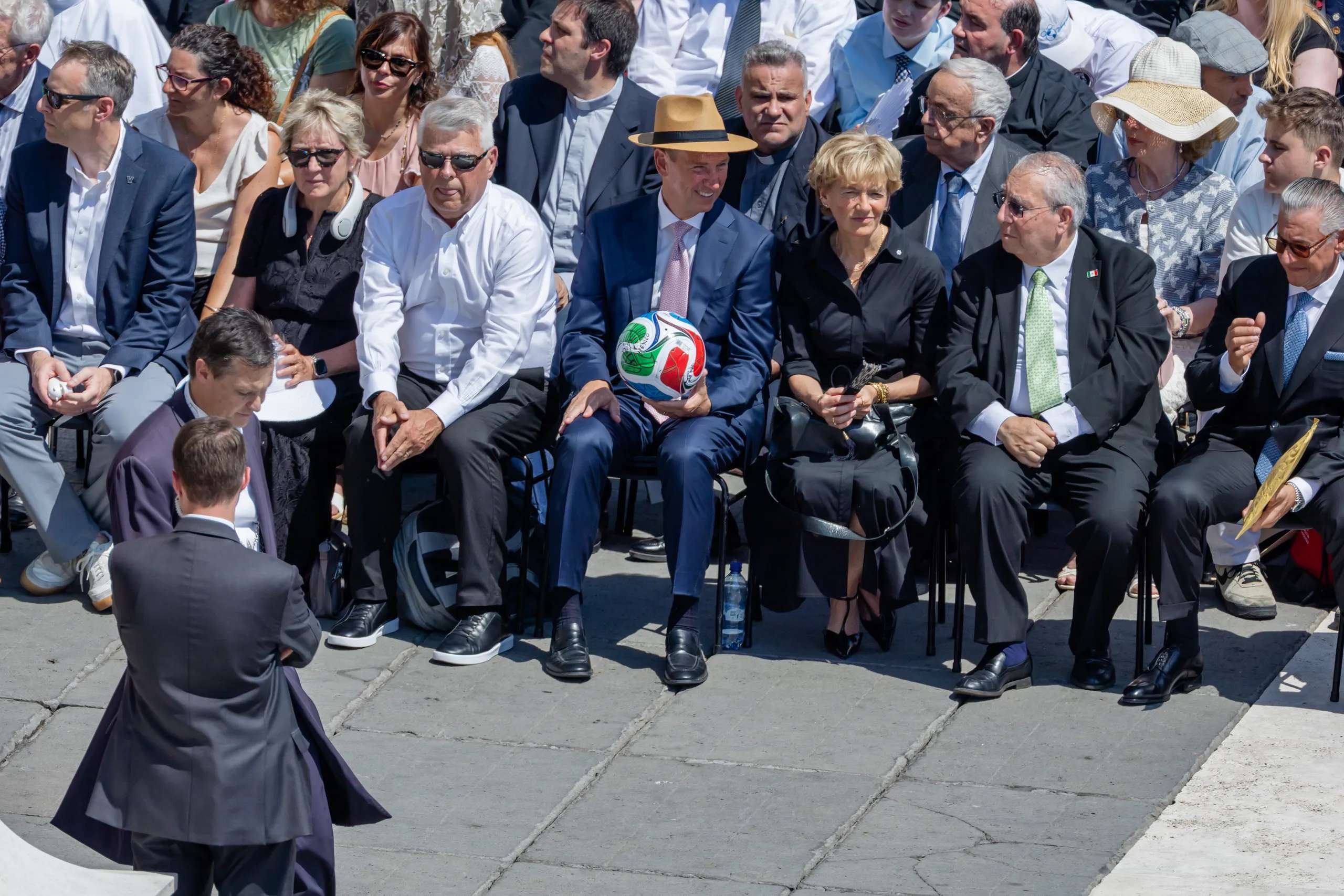 U.S. Ambassador to the Holy See Brian Burch holds an official FIFA World Cup soccer ball at the June 17 General Audience at the Vatican (Credit: Zeale News)